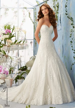 Wedding Dress - Mori Lee Blue SPRING 2016 Collection: 5404 - Embroidered Lace Appliques Decorate the Net Gown with Scalloped Hemline Over Soft Satin | MoriLee Bridal Gown
