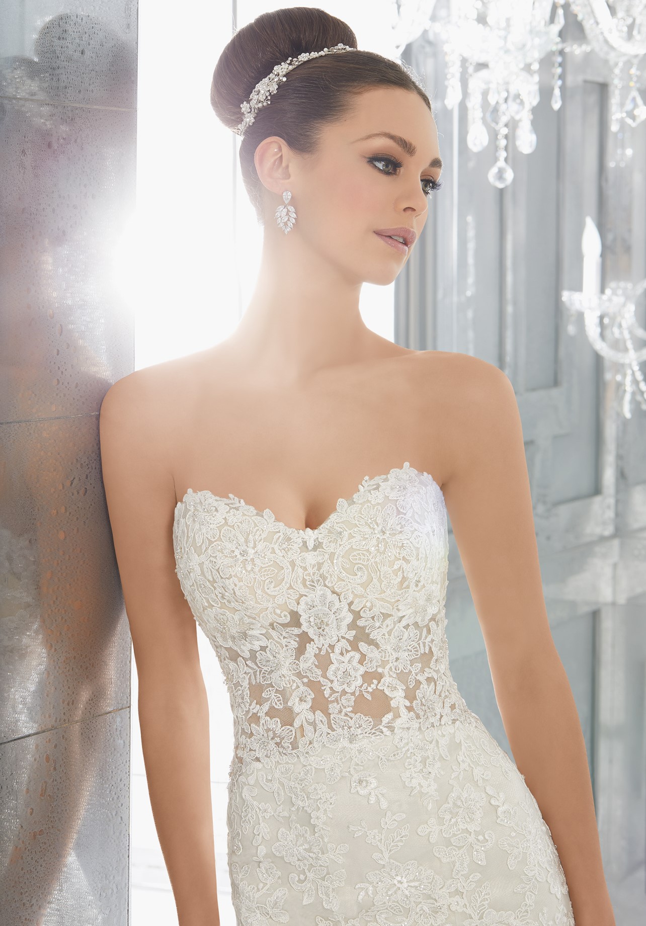 Stun with a see-through bodice and sweetheart neckline wedding dress