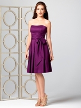 Prom Dress: Dessy Bridesmaid SPRING 2012- 2857  Fabric: Cotton VoileStrapless cocktail length cotton voile dress with wrap detail at bodice. Self sash at natural waist. Pleated skirt has pockets at side seams.Dress Color Sample: aubergine 