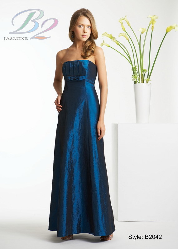 Bridesmaids Dress: B2 Spring 2009 - Style B2042  Catalogue Color:  NIGHT BLUE (NB)  Silhouette:  Strapless Luxe taffeta gown with A-line skirt. Pleated bodice with bow at empired and keyhole pleated back.  Fabric-top layer:  LUXE TAFFETA  Accessory:  Detachable spaghetti straps  Skirt Length:  Available in floor length. Tea length can be special ordered, at no additional charge.  Size Range:   2-28  