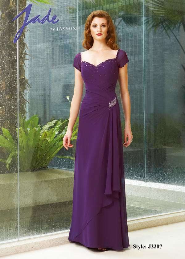 Prom Dress: JADE - J2207  Catalogue Color:  BORDEAUX (BX)  Silhouette:  Jade Chiffon gown has beaded bodice with sweetheart neckline and short sleeves. Side gathered waist with applique. A-line skirt with assymetrical tier and back gathers.   Fabric-top layer:  JADE CHIFFON  Accessory:  N/A  Skirt Length:  Floor  Size Range:   2-26  