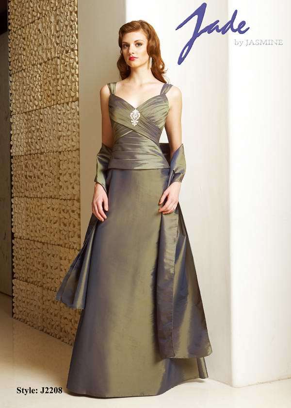 Prom Dress: JADE - J2208  Catalogue Color:  CELADON (CL)  Silhouette:  Jade Taffeta mock two-piece gown has ruched sweetheart bodice and straps. Center front bodice has beaded/embroidered applique. A-line skirt and matching shawl.  Fabric-top layer:  JADE TAFFETA  Accessory:  Shawl  Skirt Length:  Floor  Size Range:   2-26  