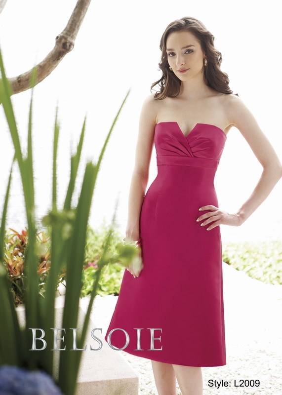 Prom Dress: BELSOIE Spring 2009 - Style L2009  Catalogue Color:  PEONY (PY)  Silhouette:  Satin strapless neckline with a v-open detail. Gown has an empire waistband with a plain a-line skirt.  Fabric-top layer:  SUPREME SATIN  Accessory:  Detachable spaghetti straps  Skirt Length:  Available in both knee-length and floor length. Floor length for L2009A  Size Range:   2-28  