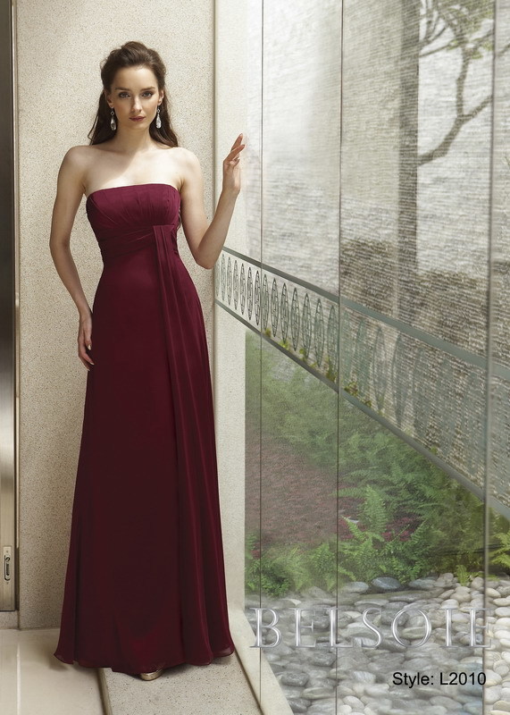 Prom Dress: BELSOIE Spring 2009 - Style L2010  Catalogue Color:  BERRY (BY)  Silhouette:  Tiffany Chiffon gown with a strapless pleated neckline. Empire waist is gathered with a sash. The skirt of gown is a plain flare.  Fabric-top layer:  BELSOIE TIFFANY CHIFFON  Accessory:  Detachable spaghetti straps  Skirt Length:  Available in floor length. Tea-length can be special ordered, at no additional charge.  Size Range:   2-28  