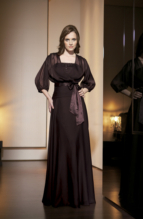 Bridesmaids Dress: JADE - J1166  Catalogue Color :  ESPRESSO (EO) Silhouette :  Jade Tiffany Chiffon gown has strapless, straight beaded neckline with criss-cross shirred waist. Flared A-line skirt. Jacket has puffed sleeves with gathered edges and Charmeuse waistband tie. Fabric-top layer :  JADE TIFFANY CHIFFON and CHARMEUSEGown or 2 piece :  DressJacket :  Front Neckline :  StraplessBack Neckline :  StraplessFront Bodice Detail :  Beading and gatheredBack Bodice Detail :  GatheredSleeve :  Gown :  Belt or Sash Detail :  Plain CHARMEUSE waistband on jacketWaist :  Drop-ScoopFront Skirt Detail : PlainBack Skirt Detail :  PlainFront Hem Detail :  PlainBack Hem Detail :  PlainAccessory :  Jacket and strapsSkirt Length :  FloorSize Range :  2-26 