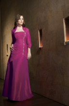 Evening Dress: JADE - J1177  Catalogue Color :  PEONY (PY)Silhouette :  Jade Taffeta gown has straight, strapless neckline with side gathering and vertical flower beading detail. Matching jacket has 3/4 length sleeves.Fabric-top layer :  JADE TAFFETAGown or 2 piece :  DressJacket :  Front Neckline :  StraplessBack Neckline :  StraplessFront Bodice Detail :  Beaded embroidery and gatheredBack Bodice Detail :  GatheredSleeve :  Gown :  Belt or Sash Detail :  N/AWaist :  DropFront Skirt Detail : PlainBack Skirt Detail :  PlainFront Hem Detail :  PlainBack Hem Detail :  PlainAccessory :  Jacket and strapsSkirt Length :  FloorSize Range :  2-26 