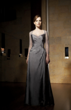 Bridesmaids Dress: JADE - J1181  Catalogue Color :  SILVER (SL) Silhouette :  Jade Silk Dupioni gown has sweetheart neckline with side gathered bodice and beaded/emb crystal applique. Beaded/emb netted 3/4 length sleeves and back bodice with keyhole opening. A-line skirt.Fabric-top layer :  SILK DUPIONI and NETTINGGown or 2 piece :  WholedressJacket :  Front Neckline :  SquareBack Neckline :  BoatFront Bodice Detail :  Beaded embroidery and gatheredBack Bodice Detail :  BeadingSleeve :  Gown :  Belt or Sash Detail :  N/AWaist :  NoFront Skirt Detail : PlainBack Skirt Detail :  PlainFront Hem Detail :  PlainBack Hem Detail :  PlainAccessory :  N/ASkirt Length :  FloorSize Range :  2-26 