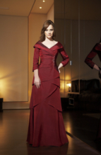 Bridesmaids Dress: JADE - J1186  Catalogue Color :  BERRY (BY)Silhouette :  Jade Silk Dupioni gown has overlapping portrait neckline; bodice is shirred with side beaded/emb detail and 3/4 length sleeves. Skirt has front assymetrical layers with horizontal back layering.Fabric-top layer :  SILK DUPIONIGown or 2 piece :  DressJacket :  Front Neckline :  PortraitBack Neckline :  BoatFront Bodice Detail :  Beaded embroidery and gatheredBack Bodice Detail :  PlainSleeve :  Gown :  Belt or Sash Detail :  N/AWaist :  NatureFront Skirt Detail : LayersBack Skirt Detail :  LayersFront Hem Detail :  PlainBack Hem Detail :  PlainAccessory :  N/ASkirt Length :  FloorSize Range :  2-26 