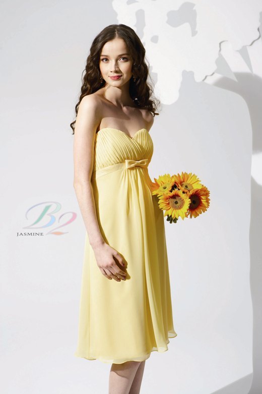 Bridesmaids Dress: B2 FALL 2009 - B2080  Catalogue Color :		BUTTERCUP (BC)	Fabric-top layer :		POLY CHIFFON and POLY SATIN	Accessory :		Spaghetti straps	Skirt Length :		Available in both knee-length 25