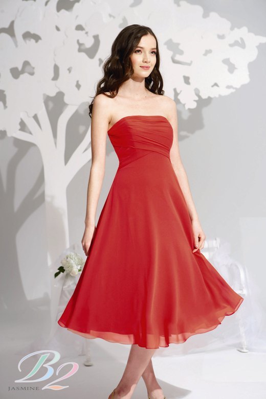 Bridesmaids Dress: B2 FALL 2009 - B2089  Catalogue Color :		MANGO TANGO (PG)	Fabric-top layer :		POLY CHIFFON	Accessory :		Spaghetti straps	Skirt Length :		Available in both tea-length 30