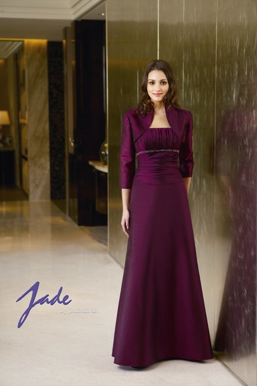 Prom Dress: JADE - J2263  Catalogue Color :		PLUM (PM)	Fabric-top layer :		JADE TAFFETA	Accessory :		Jacket and straps	Skirt Length :		Floor length. Skirt length can be changed to tea-length or knee-length.	Size Range : 		2-26 