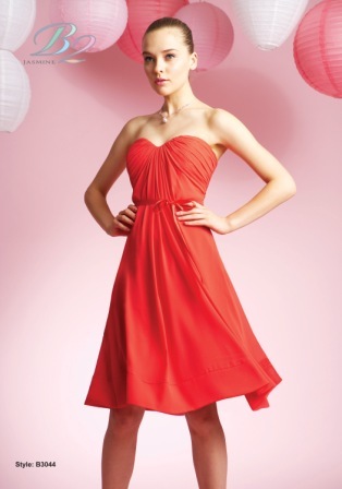 Prom Dress: B2 SPRING 2010 - B3044  Catalogue Color:		MANGO TANGO (PG)	Fabric-top layer:		POLY CHIFFON and ribbon	Accessory:		Spaghetti straps	Skirt Length:		Available in both knee-length 25