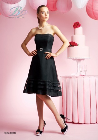 Prom Dress: B2 SPRING 2010 - B3049  Catalogue Color:		BLACK (BK)	Fabric-top layer:		ORGANZA and IRIDESCENT TAFFETA	Accessory:		Spaghetti straps	Skirt Length:		Available in both knee-length 25