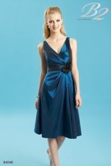 Bridesmaids Dress: B2 SPRING 2011 - B4048  Catalogue Color:		NIGHT BLUE (NB)-BLACK (BK)	Fabric-top layer:		LUXE TAFFETA and TULLE	Accessory:		Flower	Skirt Length:		Available in both knee-length 25
