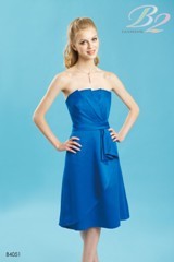 Bridesmaids Dress: B2 SPRING 2011 - B4051  Catalogue Color:		STARRY SAPPHIRE (HS)	Fabric-top layer:		POLY SATIN	Accessory:		Spaghetti straps	Skirt Length:		Available in both knee-length 25