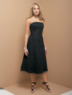Bridesmaids Dress: MoriLee - 386  A strapless A-line tea length dress with a light beading at the scalloped edge on the sheer neckline portion and tulle extending outward from the bottom scalloped edging.  Matching ribbon sash and shawl included.
Color Availability: All Lace Colors 