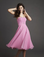 Evening Dress: Bridesmaids Collection: 763 Chiffon with  Vertically shirred chiffon on the center portion of the strapless bodice meets the draped empire with beaded buttons. Flared cocktail length skirt. Matching shawl included. Color Availability: All Mori Lee Chiffon Colors 
