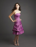 Prom Dress: Bridesmaids Collection: 764 Satin with B  Strapless bodice with beaded buttons trimming the center draping on the hips. Waterfall draping on the cocktail length skirt. Matching shawl included. Color Availability: All Mori Lee Satin Colors 