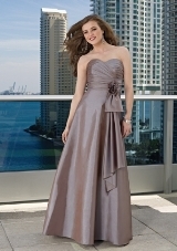 Bridesmaids Dress: Bridesmaids Collection: 287 - TAFFETA (REMOVABLE FLORAL SIDE STREAMER)  Pleated sweetheart strapless bodice with natural waist and A-line skirt. Removable floral side streamer. Sizes Available: 2-28. Please refer to Mori Lee Taffeta swatch card. Sample color: COPPER SHAWL INCLUDED. 