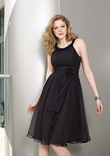 Bridesmaids Dress: Bridesmaid Affairs Collection: 858 - CHIFFON  Ruffle scoop neckline has a vertically pleated bodice and soft flowing skirt with rosette and side streamer. Sizes Available: 2-28. Please refer to the Mori Lee Chiffon swatch card.  Sample color: BLACK 