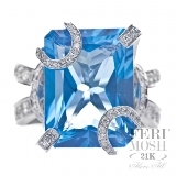 Feri-Mosh-21K-Collection | Exclusive-21k-Collection: FERI MOSH Ocean Bliss  - FM3483  FM Ocean Bliss is one of the most popular FERI MOSH designs ever. This exquisite piece was also launched at the third annual GWT world conference. The seventh wonder of the world Niagara Falls, Canada was a fitting place for the birth for the stunning 2009 FM collection which mesmerized its audience.The Ocean Bliss was an instant hit in a lineup of stars and inquires flooded the GWT head office even before it was launched on our site.EXPERTLY crafted in GWT exclusive 21K WHITE gold compound, this striking design is expertly constructed through micro setting with high quality diamonds complimenting the large center Topaz gemstone.This GWT master piece sets a new standard for high class, high design and high fashion that combines precise jewellery making and quality jewellery craftsmanship. FM Ocean Bliss is a show stopper and crowd pleaser.All Feri Mosh Pieces will include a Customized IGI FERI MOSH Appraisal and the industry leading FERI MOSH five year maintenance free guarantee.The fine diamonds SET on all FM designs go through the most intensive sorting process by master gemologist from some of the world's largest diamond dealers to insure they are amongst the best in the world. The stone mastery is completed through MICRO Setting that can only be done by master setters.  