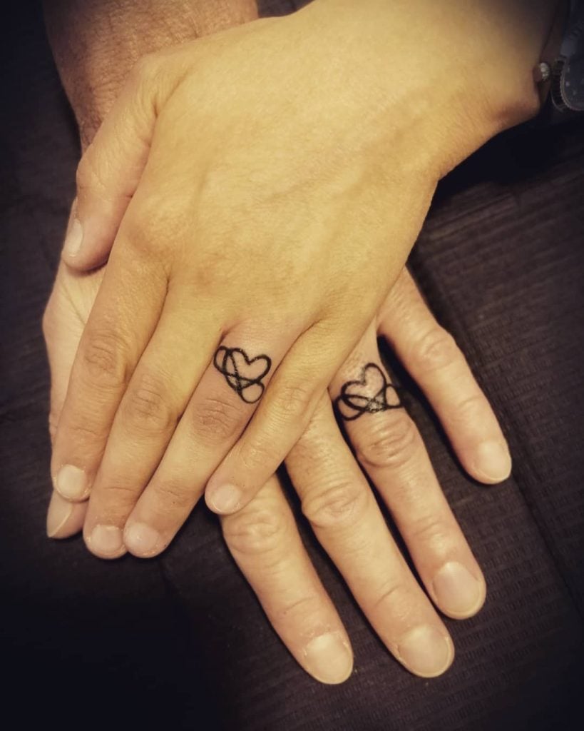 couples wedding ring tattoo