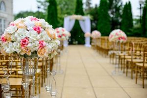 wedding aisle flower arrangement