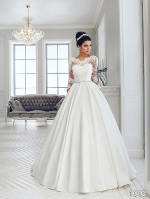 Wedding Dress - Sans Pareil Bridal Collection 2016: 1002 - Ball gown with beaded waistband and full length illusion sleeves | SansPareil Bridal Gown