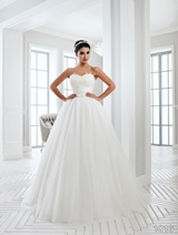 Bridal Dress: Sans Pareil Bridal Collection 2016: 1016 - Strapless ball gown with lace appliques and satin bow waistline detail 