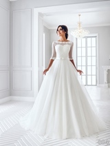 Bridal Dress: Sans Pareil Bridal Collection 2016: 884 - Lace appliques on illusion yoke with lace-trimmed three-fourth sleeves and A-line skirt 