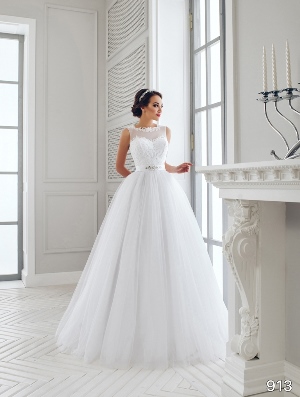 Wedding Dress - Sans Pareil Bridal Collection 2016: 913 - Illusion neckline with lace trim and lace yoke on layered A-line wedding dress | SansPareil Bridal Gown