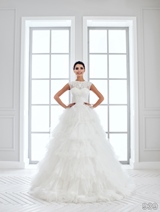 Bridal Dress: Sans Pareil Bridal Collection 2016: 939 - Opulent lace embellished illusion top meets ruffled tiered skirt 