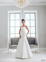 Bridal Dress: Sans Pareil Bridal Collection 2016: 965 - Lace appliques accent sweetheart wedding dress with light pink waistband and godet skirt 