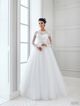 Bridal Dress: Sans Pareil Bridal Collection 2016: 969 - Embroidered lace appliques form cap sleeve effect over illusion sleeves and ball gown skirt 