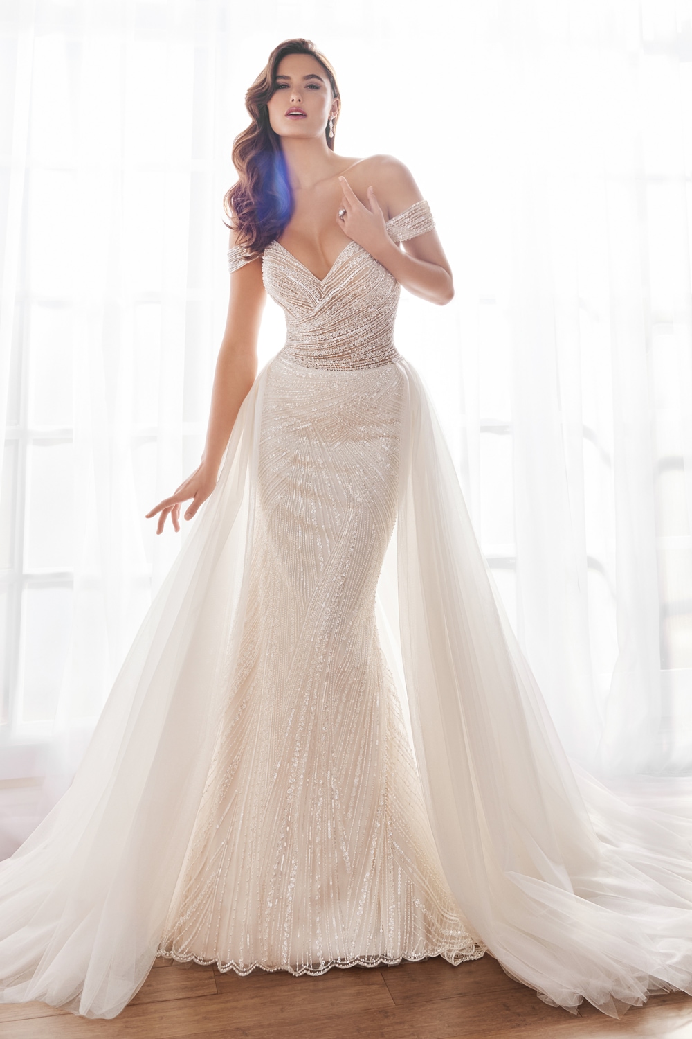 Ivory off-the-shoulder beaded wedding gown with detachable sleeves