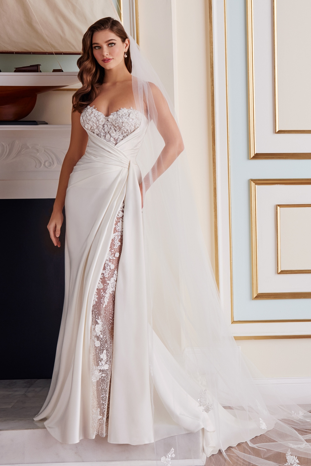 Ivory satin fitted wedding dress with lace side slit and veil