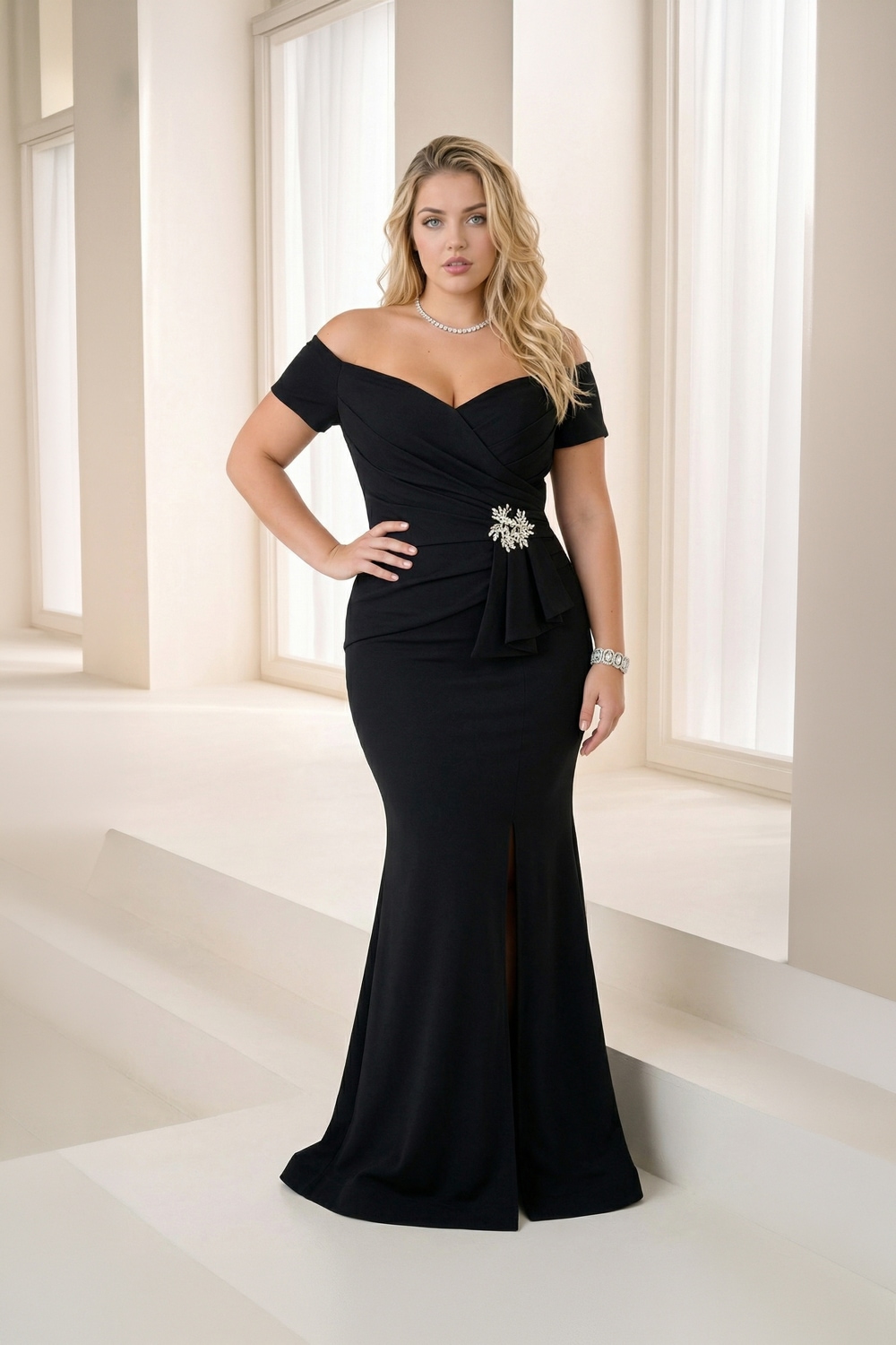Black off-the-shoulder mother of the bride gown with brooch detail